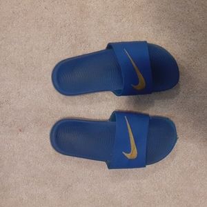 Nike blue and gold slides